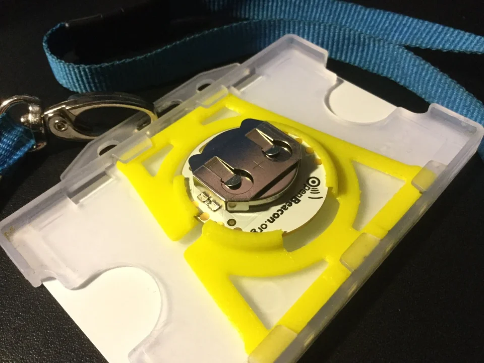 Badge holder with inlay