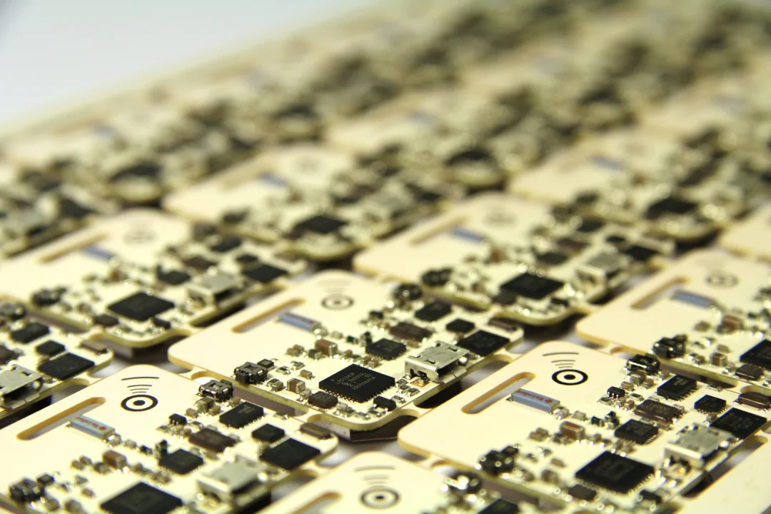 OpenBeacon tag and reader hardware on a workbench
